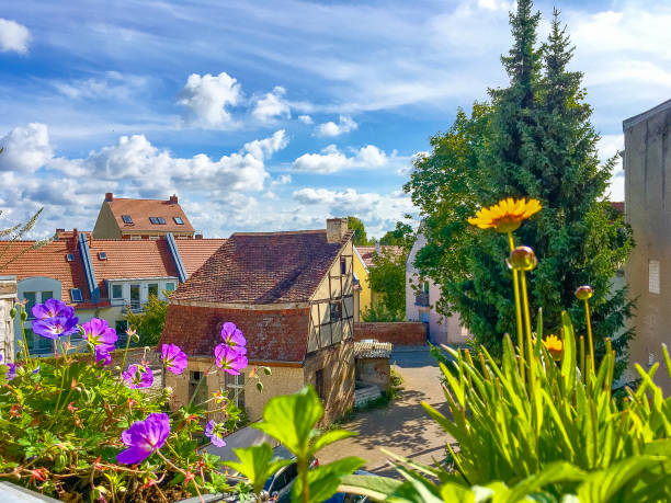Spring awakening in the city taken from the home balcony with half-timbered building