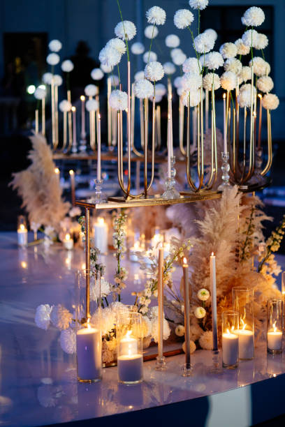 istock wedding decor night Candles, white dried flowers 1210788368