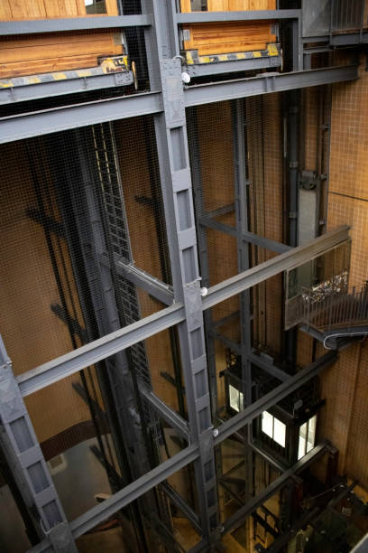 istock Elbtunnel elevator with steel girder construction and illuminated elevator 1210788534