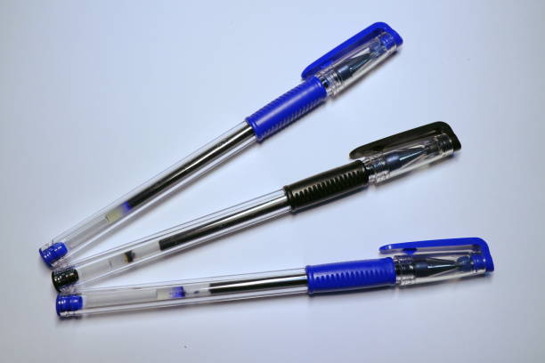 gel pens black and blue on a white background