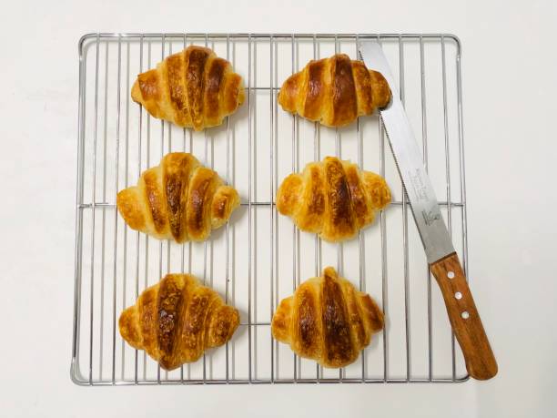 Delicious croissants that are being baked