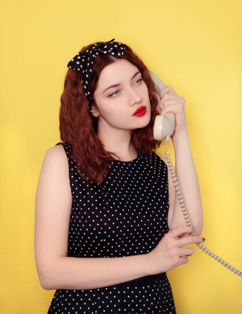 istock Young woman with telephone 1210796392