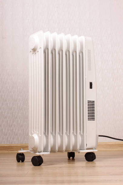 istock Oil-filled electrical radiator for additional home heating 1210804664
