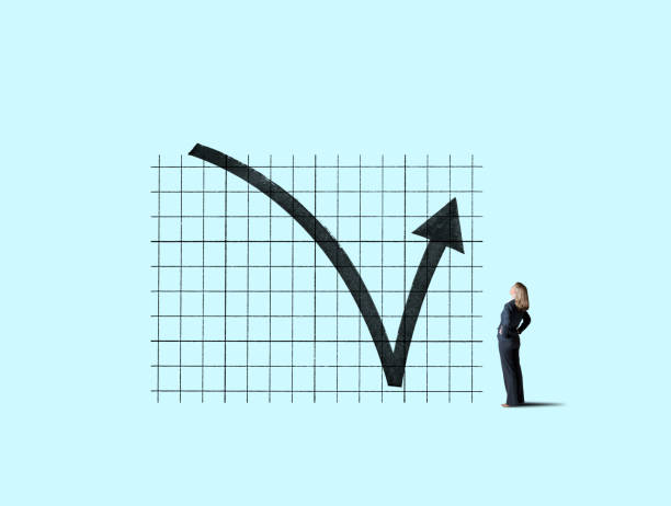istock Businesswoman Looking Up At Chart That Indicates A Performance Rebound 1210804721