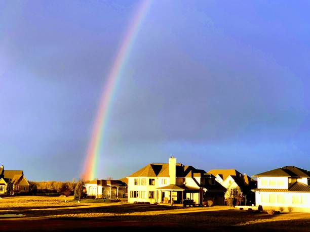 Rainbow over Indiana An early spring rainbow over the Indiana prairie landscape view of indianapolis indiana during the day stock pictures, royalty-free photos & images