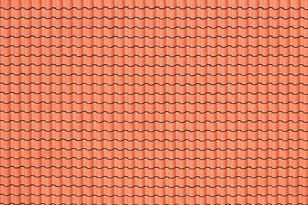 A red patterned roof as a background stock photo