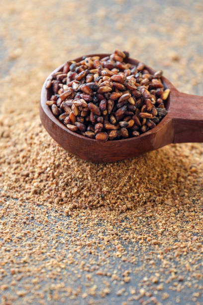 istock dry pomegranate seeds on wooden spoon 1210806455