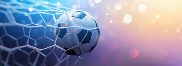 istock Soccer Ball in Goal. Multicolor Background 1210808249