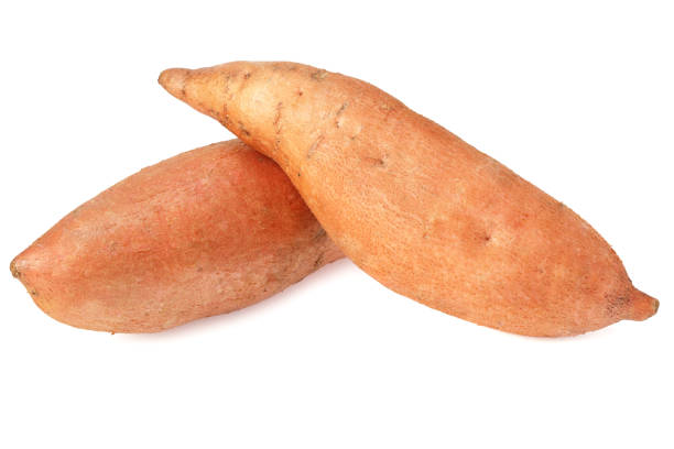 istock Sweet potatoes isolated on a white background 1210808423