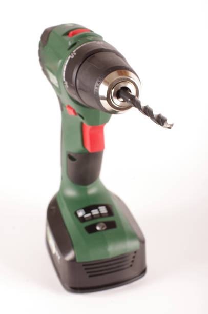 istock Cordless drill driver isolated on the white background 1210808615