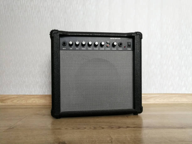 istock Guitar combo amplifier on the wooden floor 1210809513