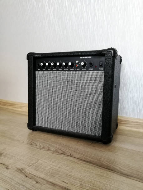 istock Guitar combo amplifier on the wooden floor 1210809549