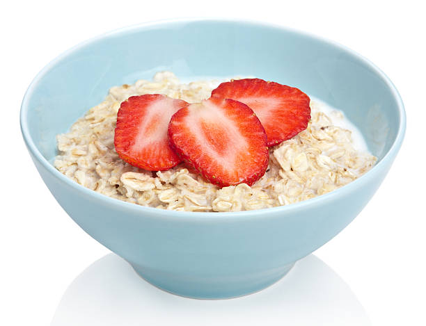 istock porridge with fresh strawberry isolated 121081035