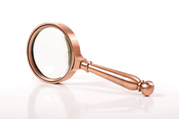 istock Professional retro style magnifying glass loupe 1210810802