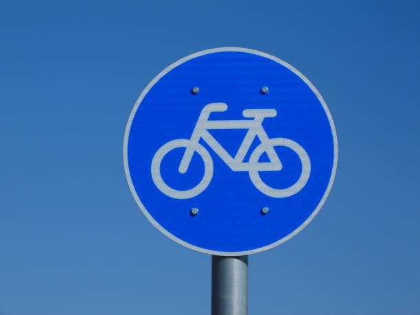 istock blue circular metal bicycle route traffic sign 1210816222