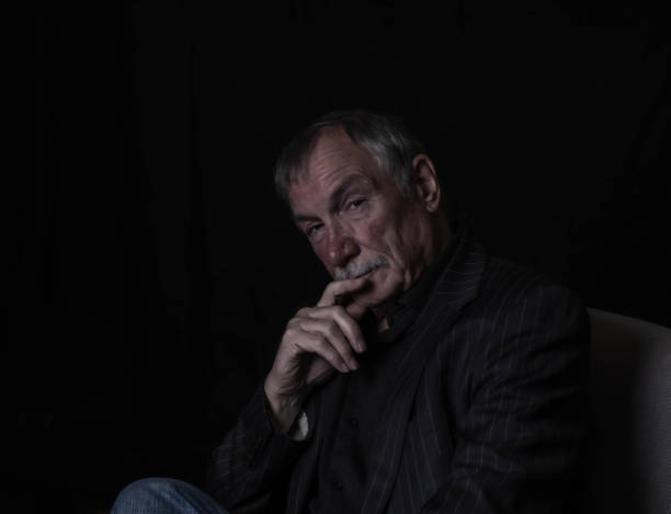 istock senior man in contemplative mood 1210816341