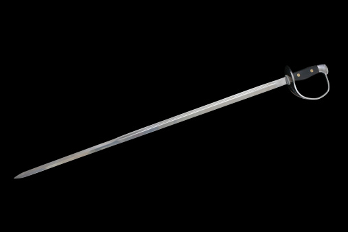Long metal sword on a black background