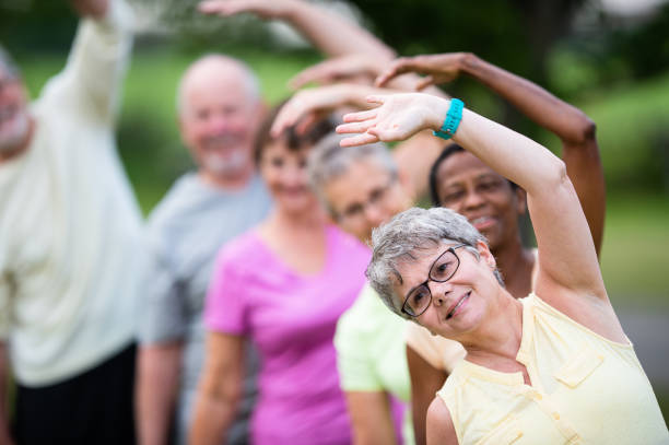 istock Seniors Stretching Class Outside stock photo 1210818910