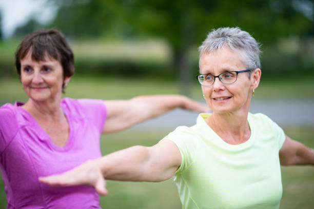 istock Seniors Stretching Class Outside stock photo 1210818925