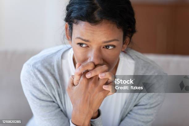 Pensive African American Woman Look In Distance Thinking Stock Photo - Download Image Now