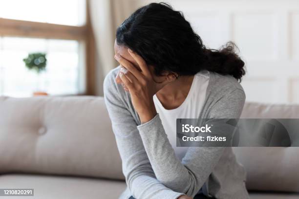 Unhappy Biracial Woman Look In Distance Feeling Depressed Stock Photo - Download Image Now