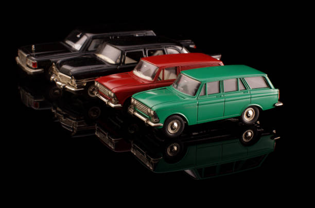istock Old vintage die cast car model collection isolated on the black background 1210821769