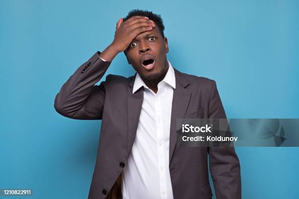 African American Black Man In Suit Slaps Himself On Head Stock Photo ...