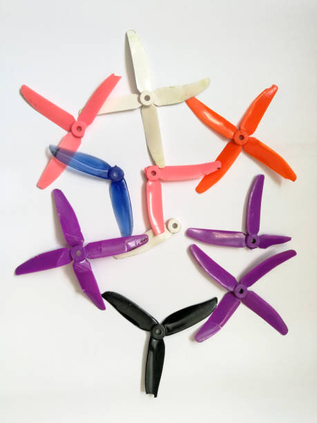 istock Many used drone propeller on the white background 1210828991