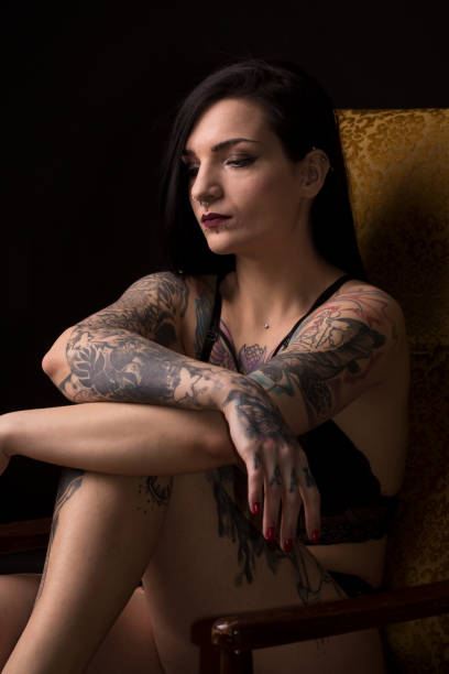 istock Young woman with tattoos 1210831898