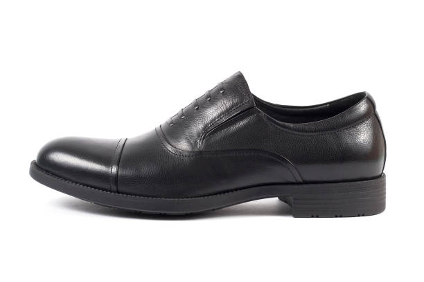 istock Classic male black leather shoe isolated on a white background 1210833571