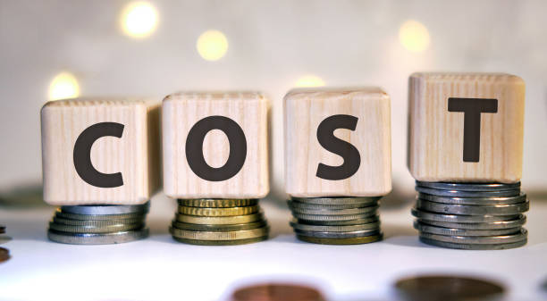 cost word - concept rising rating on coins - capital letter fotos imagens e fotografias de stock