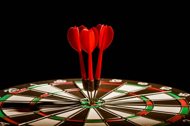 istock Hitting the bulls eye on the black background 1210835379