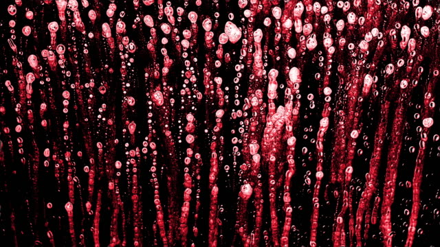 Red rain drops on a black background. The background can be remove using a blending mode like add.