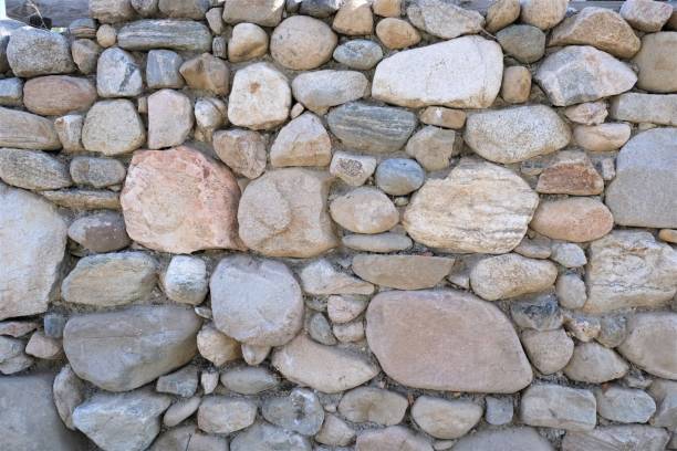 istock Close up of rock wall made from rocks found in CA 1210850177
