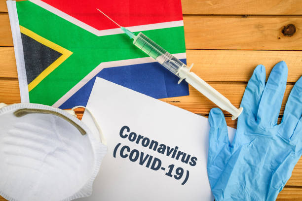Coronavirus in South Africa Flag of South Africa, vaccine, face mask for virus, glove and paper sheet with words Coronavirus COVID-19 antibiotic resistant photos stock pictures, royalty-free photos & images