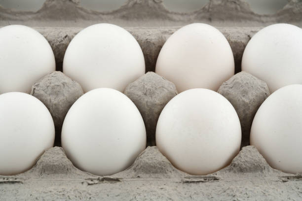 istock Close up of a tray with white eggs 1210855799