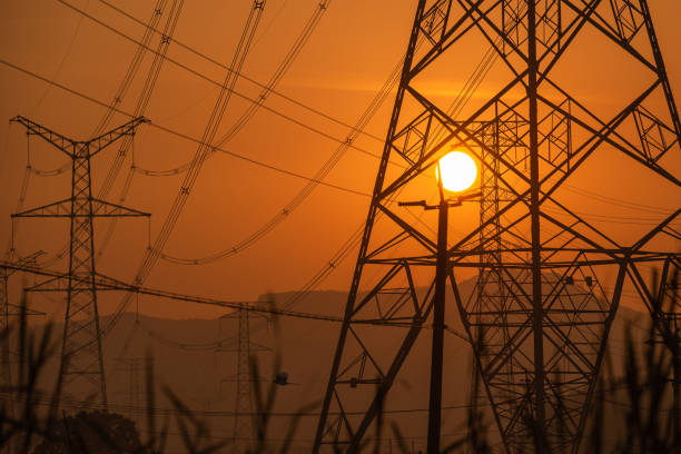 istock Electricity power pylons during sunset 1210857279