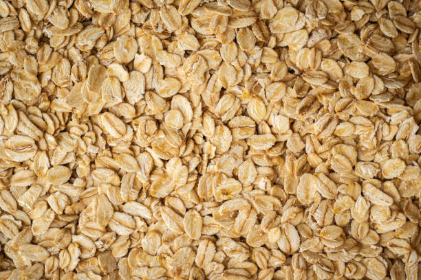 ロールオート麦 - oat oatmeal rolled oats oat flake ストックフォトと画像