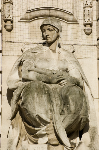 Allegorical statue depicting gunnery.  Admiralty Arch between Trafalgar Square and The Mall, Westminster, London.