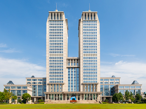 Shanghai, China - September 24, 2019: Iconic Guanghua Twin Tower at autumn on Hadan Campus, Fudan University, Shanghai, China, one of the tallest university buildings in the world.