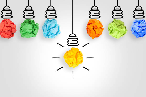 Idea Concepts Light Bulb Crumpled Yellow Paper on White Background