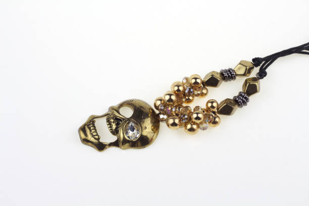 istock King skull isolated on white background. jewelry Halloween accessory. 1210882364