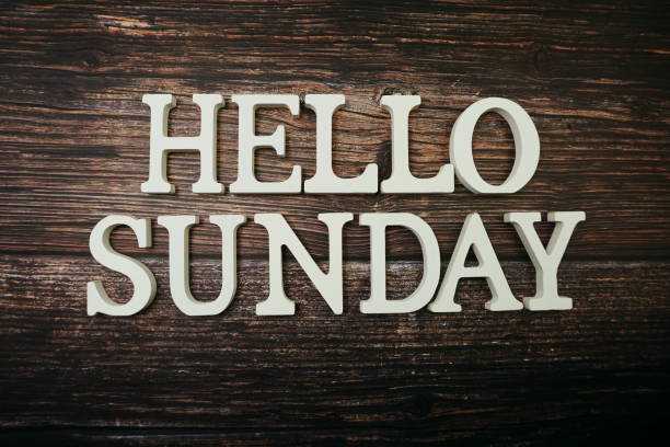 istock Hello Sunday alphabet letter on wooden background 1210886967