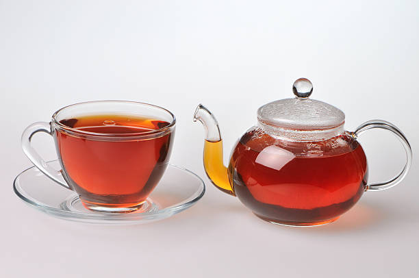 istock Teacup and teapot with black tea 121088968