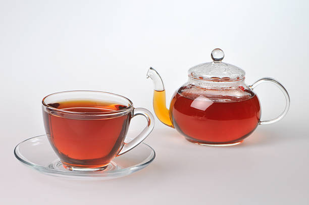 istock Teacup and teapot with black tea 121088975