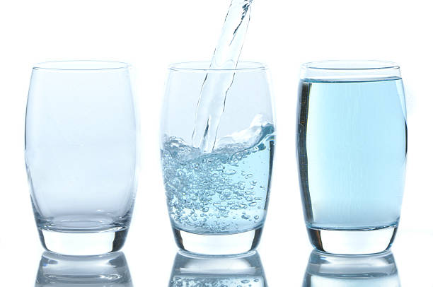 istock Stream of water falling in a glass 121089084