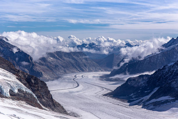great aletsch glacier world heritage of swiss and bernese alps and jungfrau snow mountain peak view from jungfraujoch top of europe with blue sky in summer background and copy space, switzerland - monch sun snow european alps imagens e fotografias de stock