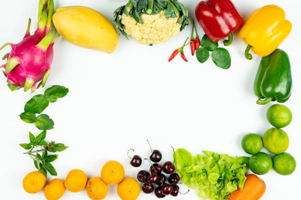 istock Fresh fruit and vegetable. Frame of fresh raw organic vegetables on white background 1210896958