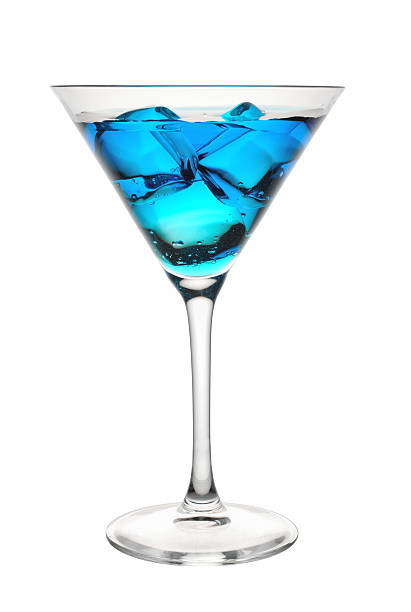 istock Blue tropical coctail in martini glass on a white background 121089770