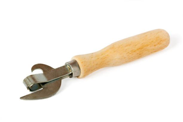 istock Can opener with wood handle isolated on white 1210898564